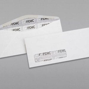 Front and back of a #10 Standard Window Envelope Black FDIC Security Tint with Regular Gum