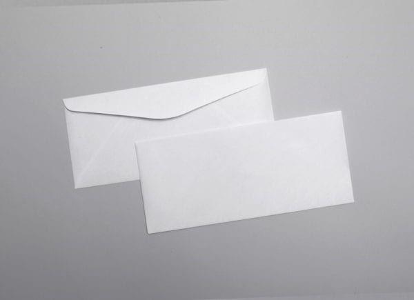 Front and back of a #10 Regular Envelope Blue Security Tint with Regular Gum