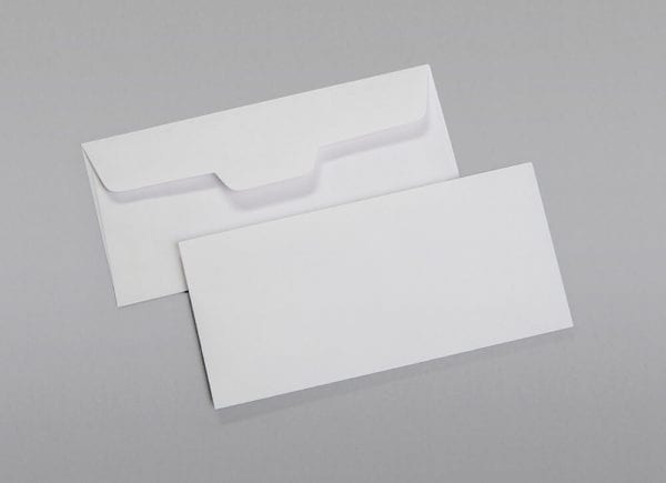 Front and back of a 3 1/4 x 7 Regular Open Side Envelope with Latex Gum