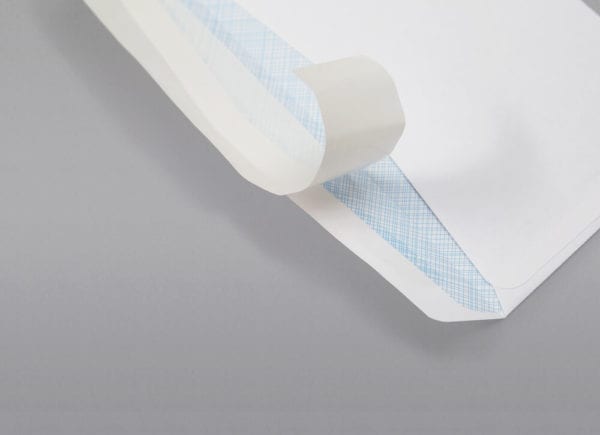 Back of a #10 Standard Window Envelope Blue Security Tint featuring the peel & stick adhesive