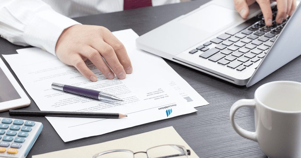 Hand on Top of Document on a Cluttered Desk - Business - Letter Jacket Envelopes